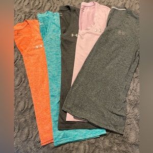 5 dry-fit Women’s Under Armour shirts